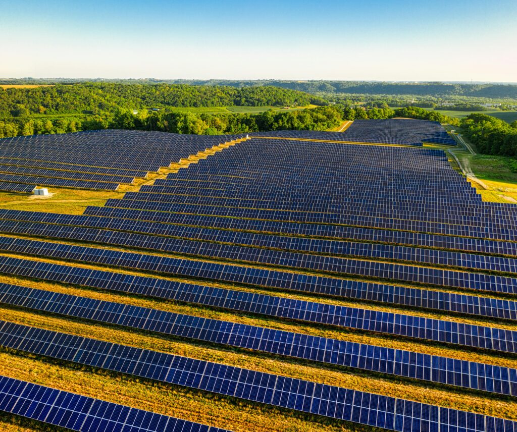 Aerial view of a vast solar farm in Red Wing, MN, generating renewable energy.